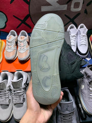 Kaws x Air Jordan 4