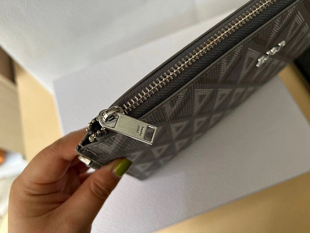 Dior diamond pattern clutch