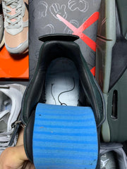 Kaws x Air Jordan 4