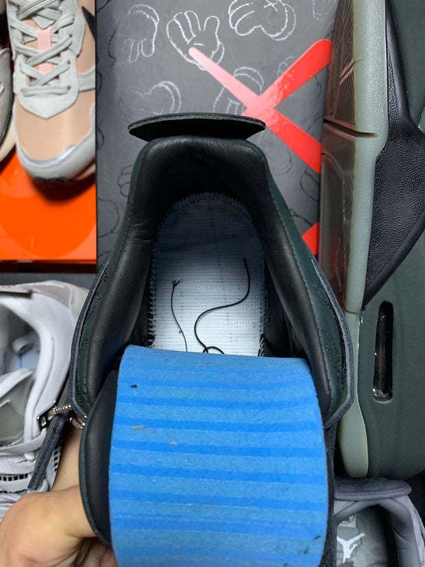 Kaws x Air Jordan 4