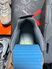 Kaws x Air Jordan 4