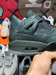 Kaws x Air Jordan 4