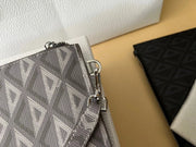 Dior diamond pattern clutch
